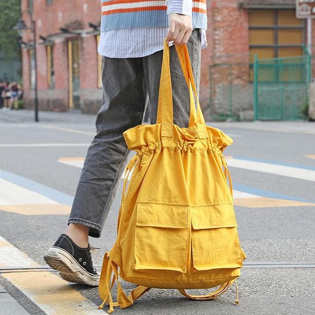 New outfit Design Double Front Pockets Simple Drawstring yellow Backpacks -  - DINIBLO 