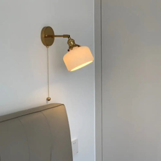 Brass Pivot Joint Foyer Sconce: Round Ribbed Glass Wall Light with White Simplicity (1 Bulb) -  - DINIBLO 